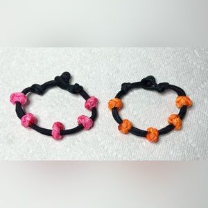 Set of 2 Black Parachute Cord Bracelets Adjustable Braided Bead Pink and Orange
